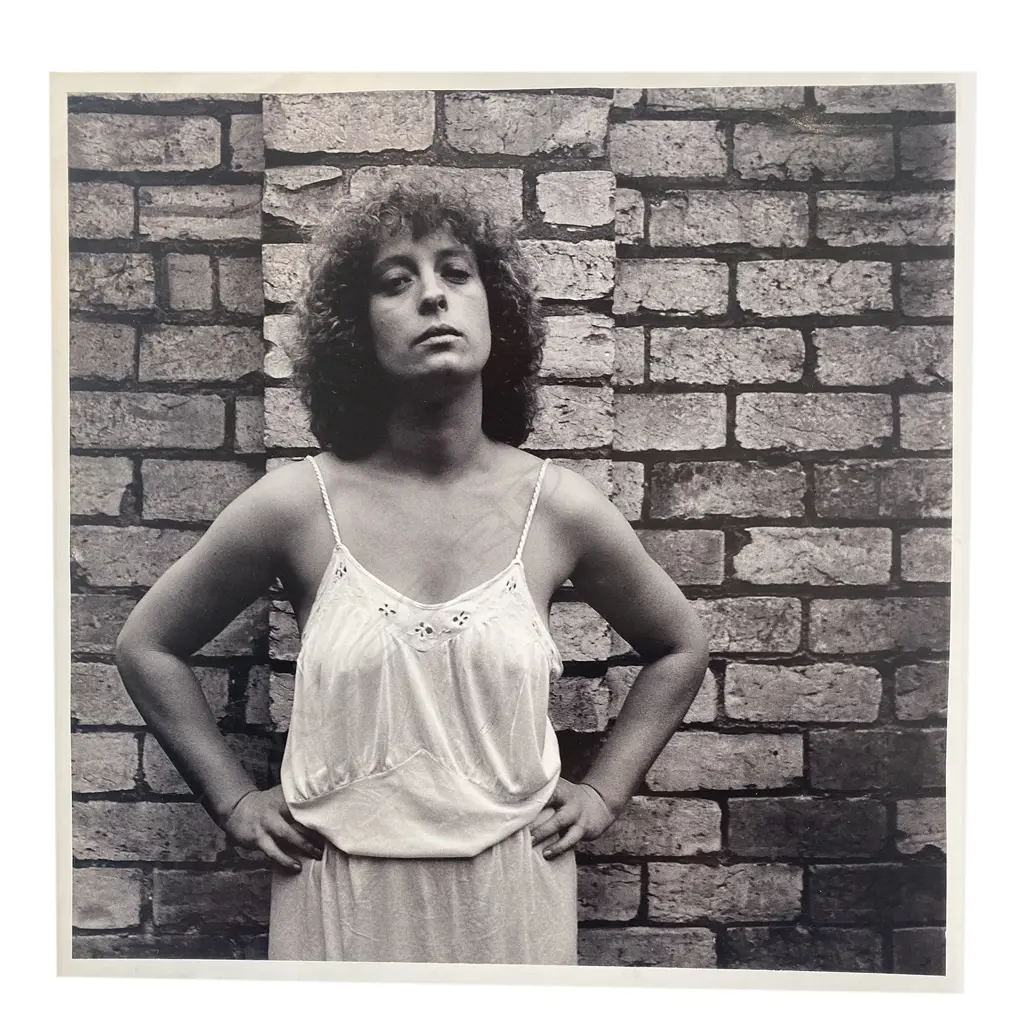 Unidentified photographer ‘Portrait of woman standing in front of brick wall’, Image 1++